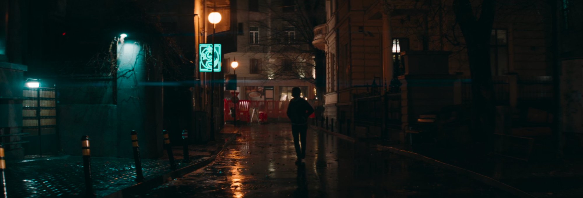 Baxter walking the rain-soaked streets of Bucharest at night — cyan and amber light reflecting off cobblestones