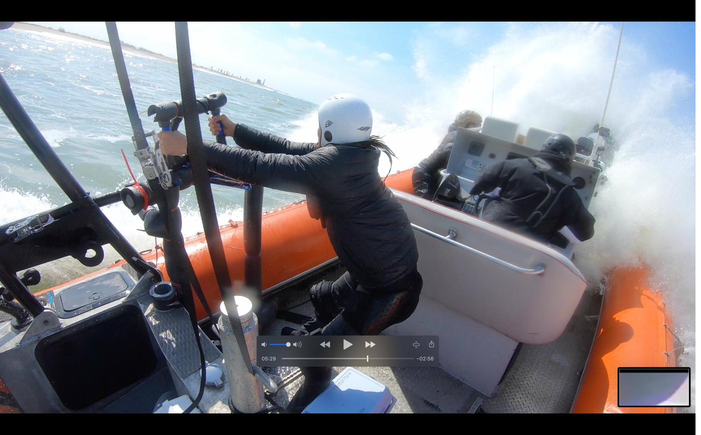 On the water during the Bahamas shoot — boats, waves, and camera rigs