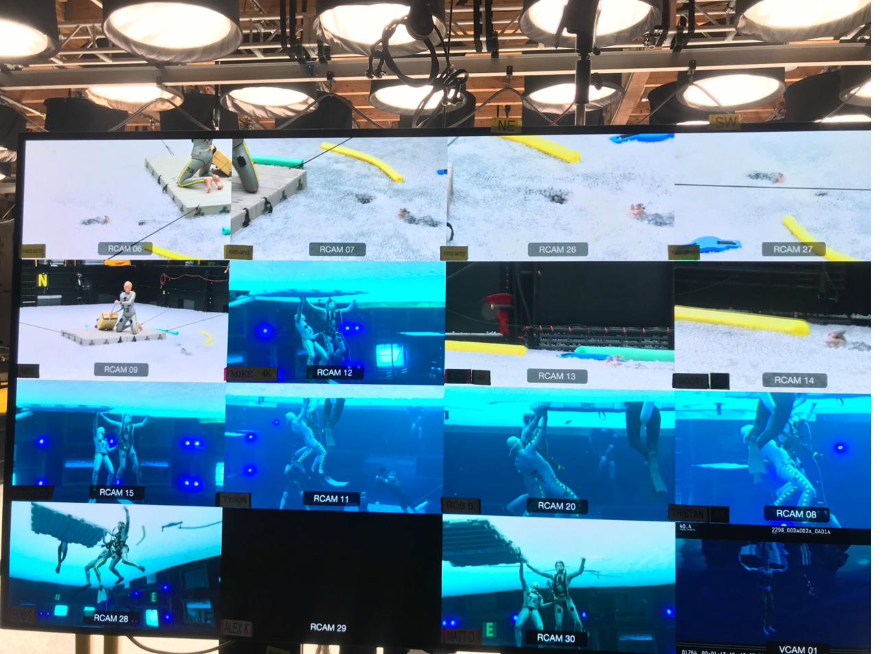 The 16-feed monitor wall showing all reference camera angles — underwater and above