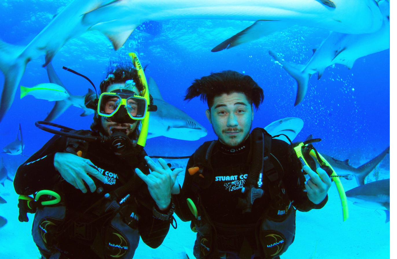 Nathan Haugaard and Steve Brown SCUBA diving with sharks in the Bahamas
