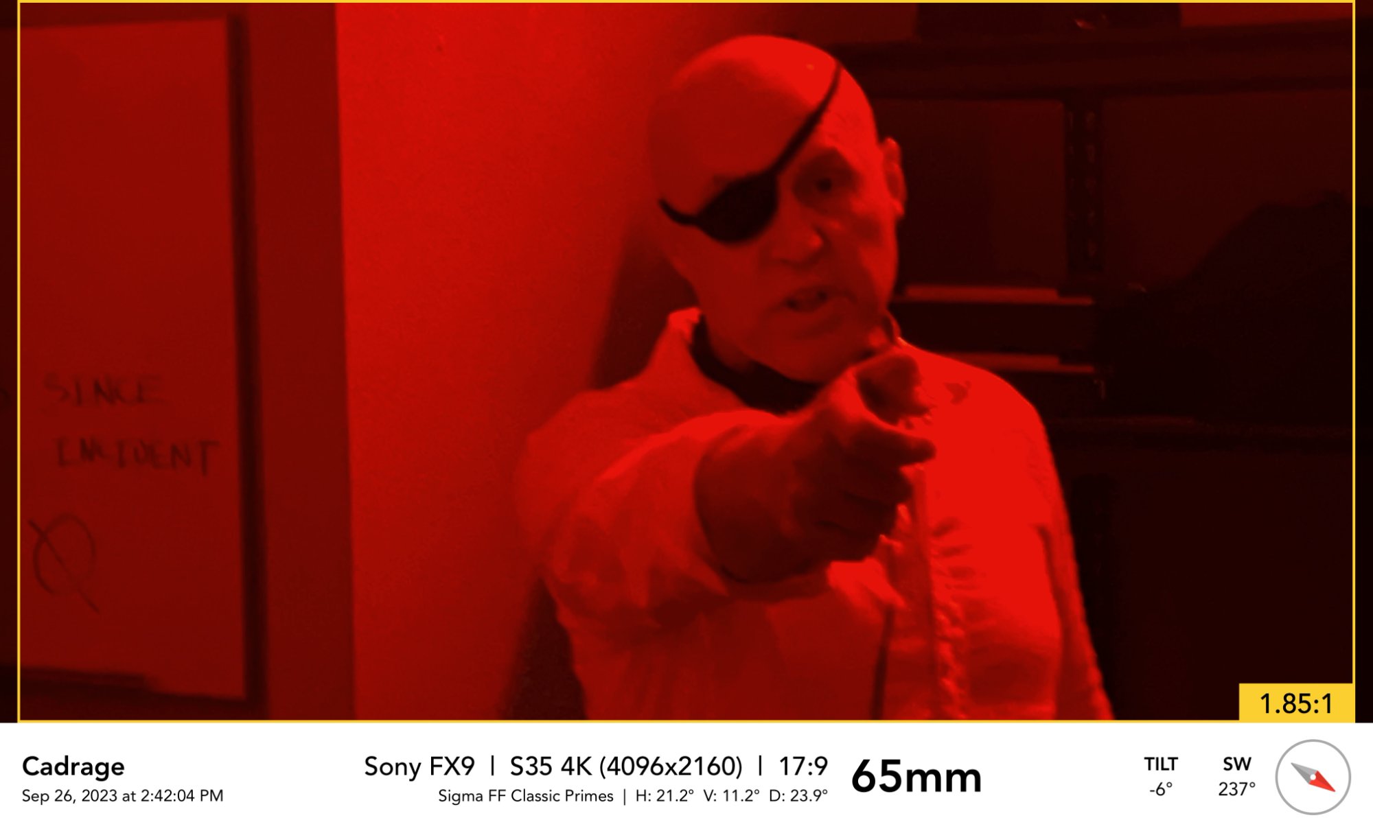 Cadrage viewfinder app — framing the villain in red light at 65mm on the Sony FX9