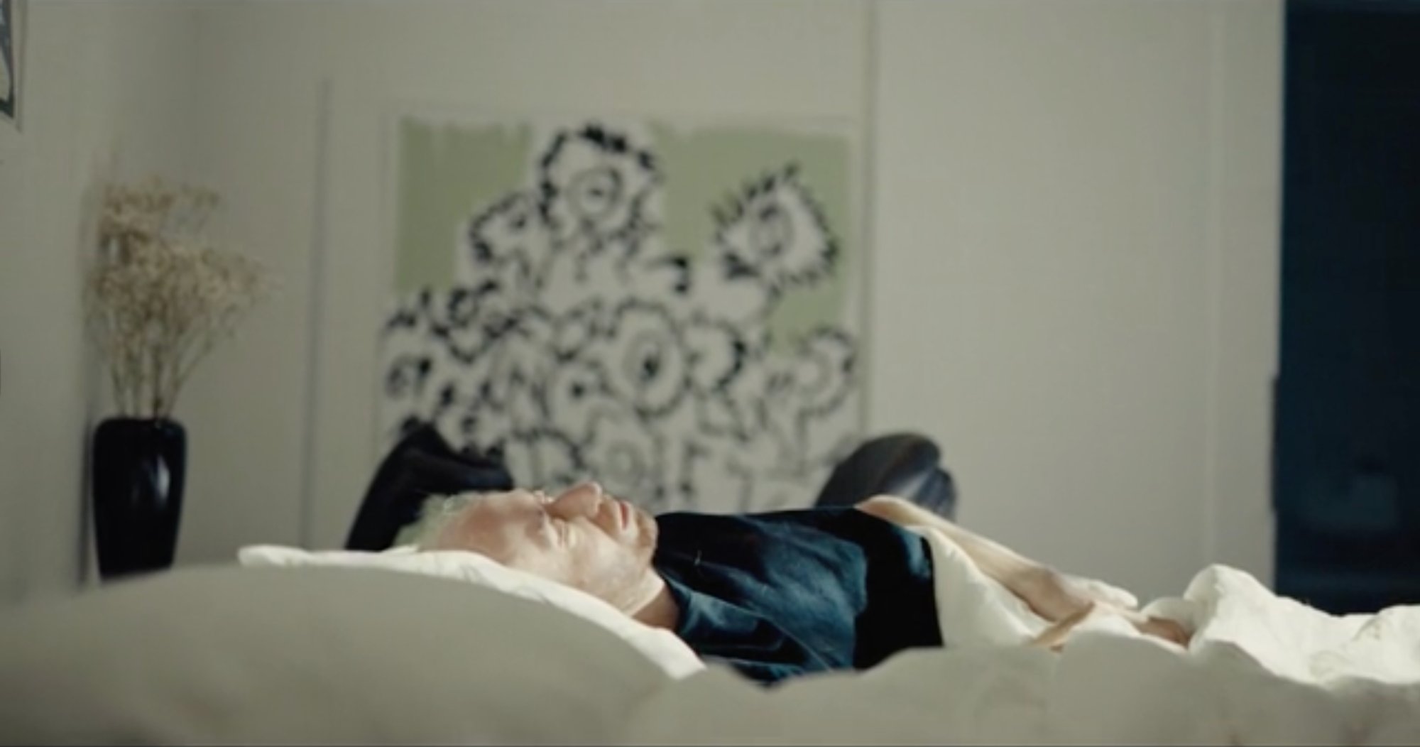 Final frame from Good Bad Things - Danny waking up, shot day-for-night with the palm frond breathing light technique