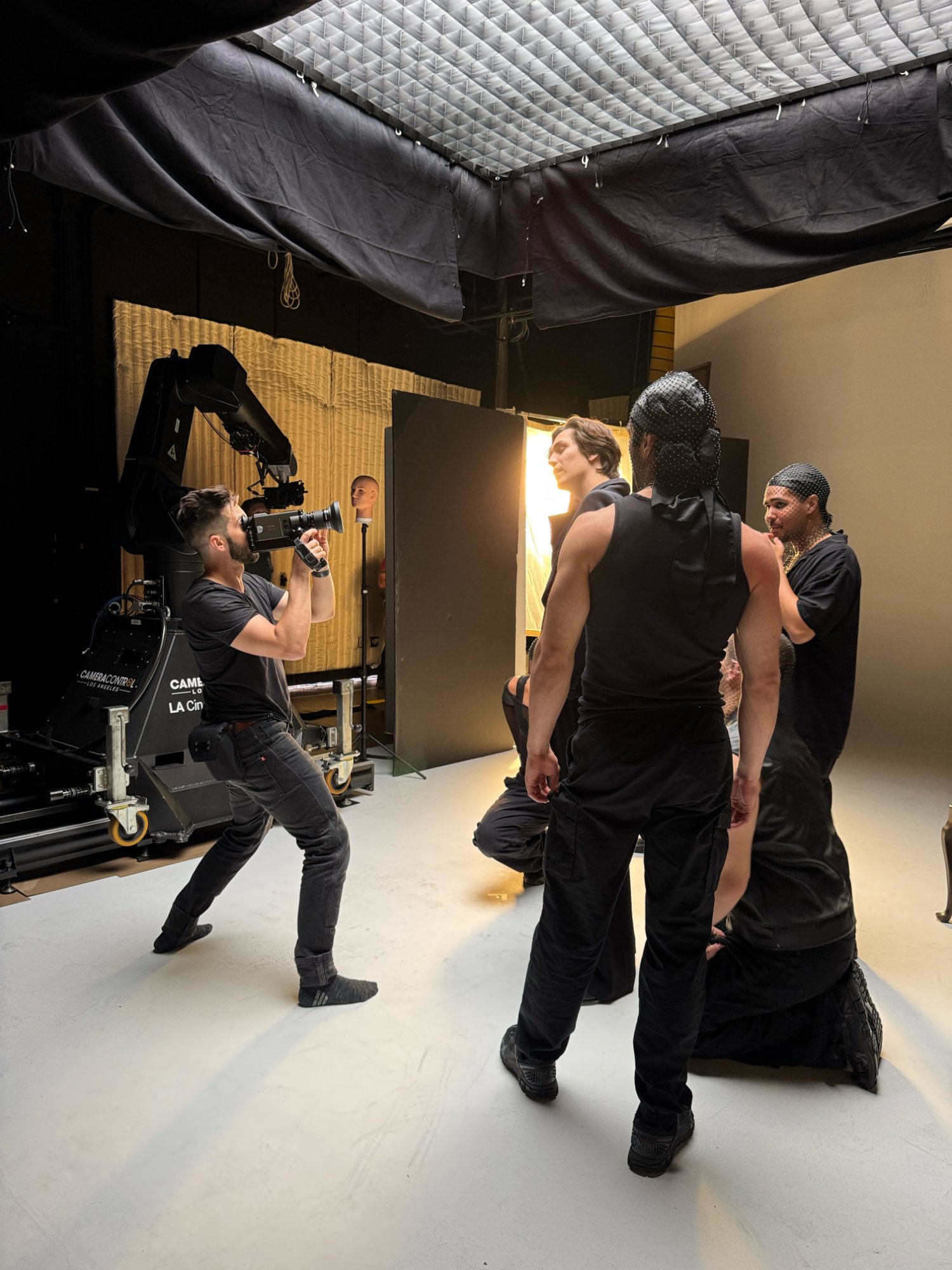 The 8mm camera operator shooting handheld alongside the Bolt motion control rig from Camera Control LA